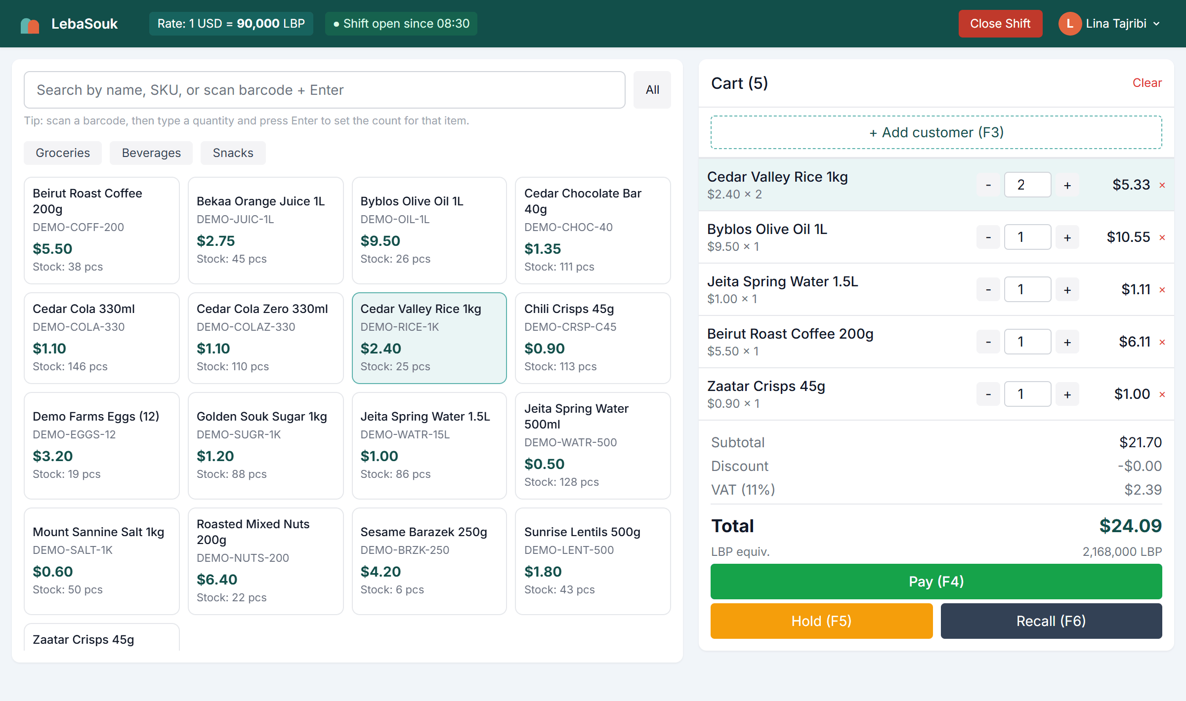 The LebaSouk point-of-sale screen during a sale: a five-item cart totalling $24.09, with the Lebanese pound equivalent of 2,168,000 LBP shown beneath it.